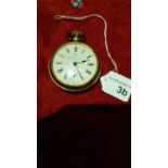 Gents Gold plated Ingersoll of London pocket watch winding top and ticks nicely.