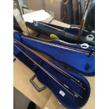 3 violin bows with violin case.