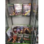 Shelf of xbox 360 games.