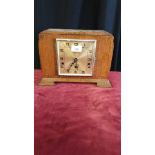 Art deco 3 hole mantle clock with silent chimer.