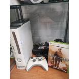 Xbox 360 console with power supply, controller and game.