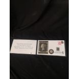 The 175th anniversary of the penny Black 22 - carat gold sovereign stamp presentation cover..