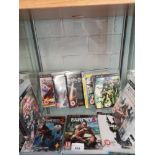Shelf of PlayStation 3 games.