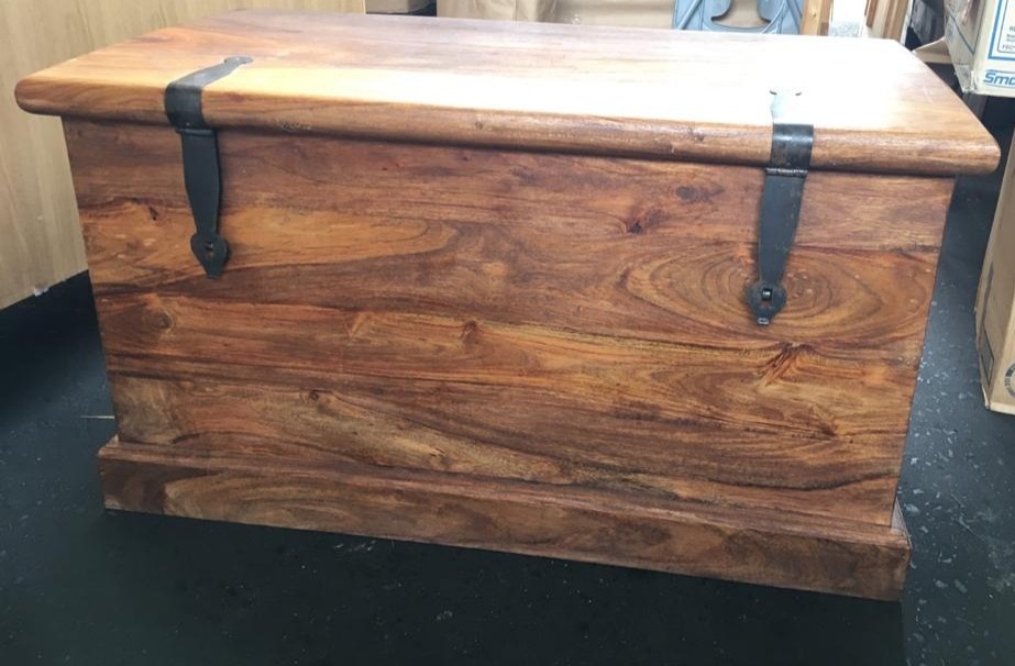 Rustic Mexican pine style trunk with fitted handles.