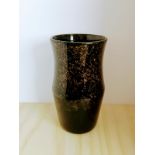 Early Strathearn 8 inch vase in dark brown with golden fleck design.