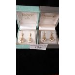 2 Pairs of 9ct gold pearl drop earrings .