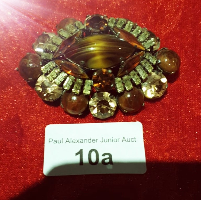 Early large elaborate brooch With Tiger eye Centre with Amethyst and clear Stones Stunning.