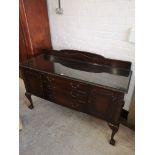 Large Ornate side board with glass preserve top. 5 ft in length.