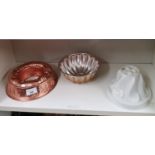 3 vintage jelly moulds.