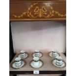 Early aynsley coffee can set with 5 silver Hall marked mounted cup holders.
