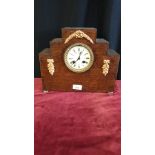 1900s mantle clock with enamel face with pendulum.