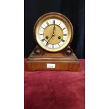 Victorian Barrell Shaped clock with pendulum with enamel clock face.