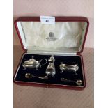 Silver Hall marked Edinburgh cruet set makers Hamilton and inches in original box.