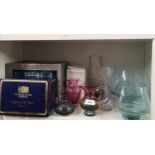 Shelf of art glass includes caithness glass.