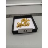 testing as 22ct gold or higher scrap gold chain weighs . 11.82 grams .