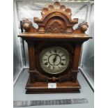 Victorian Jerome and co mantle clock with brass workings .