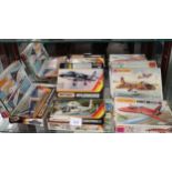 Shelf of matchbox plane models boxed .