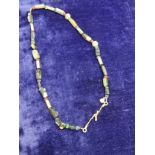 24 kt gold Arabic necklace with semi precious stones bought in Dubai .
