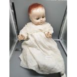 1900s Roddy Porcelain doll with opening and closing eyes .