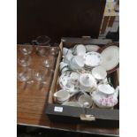 Box of tea wares together with glass drinks set.