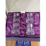 Boxed Edinburgh crystal set of 4 etched golfers glasses.