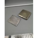 Silver hall marked Birmingham card case makers DBROS together with silver plated card case.