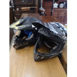 2 Motor cycle helmets .