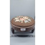 Victorian beaded work topped stool .