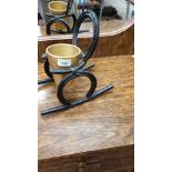 Cast iron Arts and crafts horse shoe plant stand ..