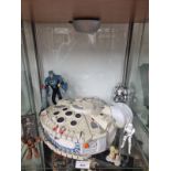 Shelf of Star war toys together with star wars picture and marvel picture etc . 2 pictures to