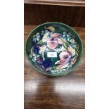 Large Early Moorcroft footed bowl orchid pattern . 19cm diameter by 9 cm height .