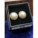 Pair of 9ct gold pearl set earrings .
