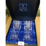 Boxed Edinburgh crystal set of 4 etched golfers glasses.