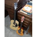 2 Acoustic guitars . 1 as found .