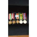 5 World war two medals italian star 1939 45 star , African star with bar , defence medal 39 45 war