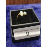 9ct gold 3 opal ring with 2 small diamonds size O and half .