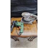 Pro heavy duty sander together with Power Drill.