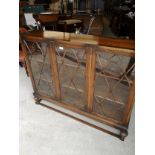 Large Oak 1900s display cabinet with pedistal support s.