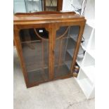 Art deco china cabinet with glazed doors.