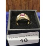 9ct gold red stone ring . size k 4.3 grams .