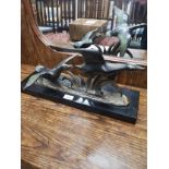 large bronze study of birds on flight on marble stand.