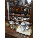 5 Piece Piquot Ware Tea service together with silver plated tea service .