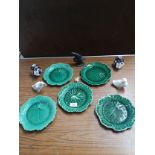 Lot of wedgewood green leaf plates together with other collectables includes 1900s small vases.