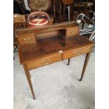 Beautiful French lady's writing desk with brass gallery fitted to top.