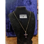 9ct gold chain set with cross amethyst stones pendant . 60 cm in length end to end , weighs 4.31