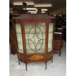 Large Maple and co London Edwardian Bow Fronted Display Cabinet with fitted shelfs .