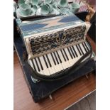 Frontalini accordian in fitted case.