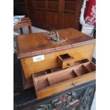 Early 1900s sewing box with drawers to front.