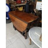 antique victorian drop leaf heavy table.