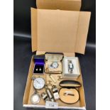 Lot of interesting items includes police whistle , pocket watch etc .